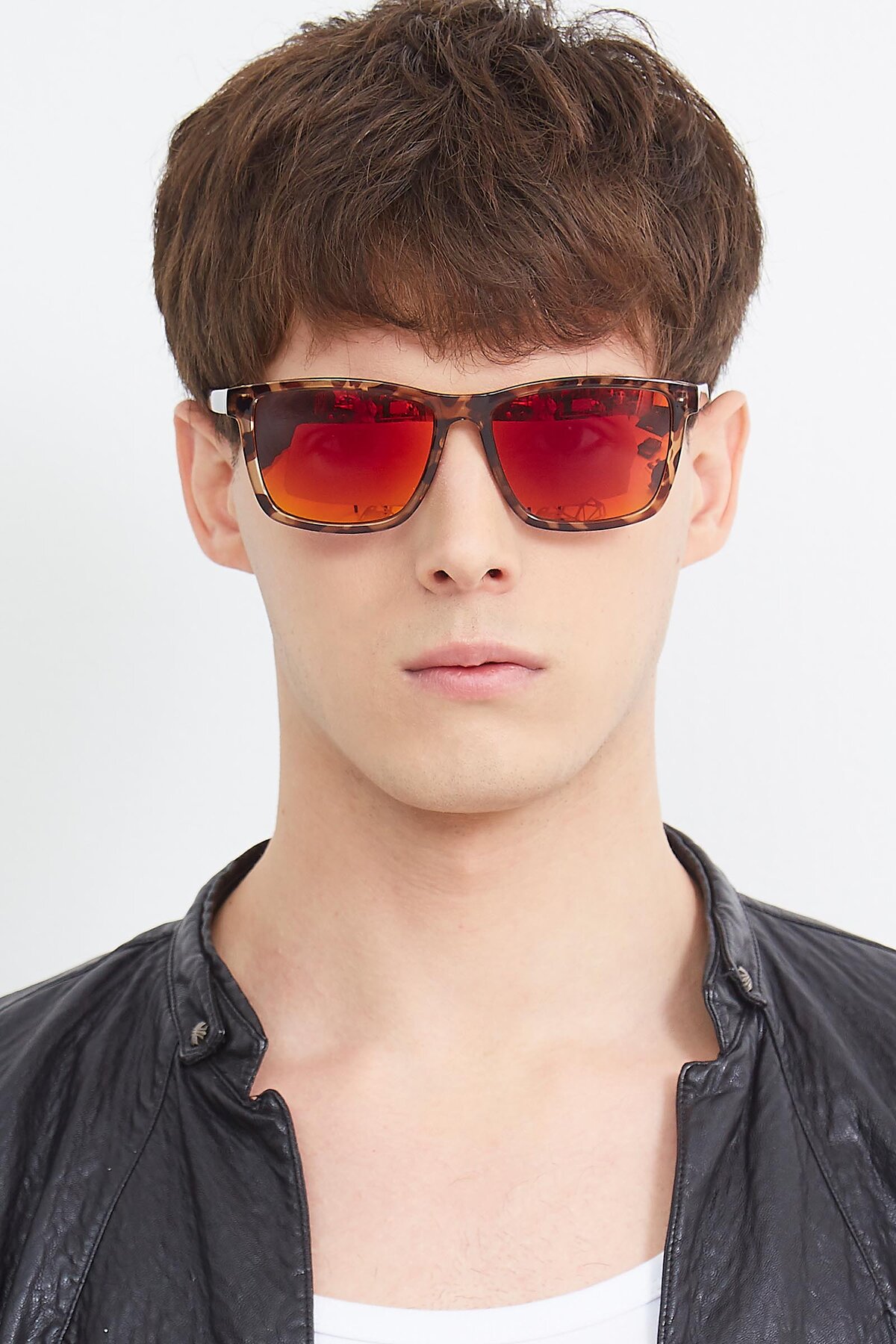 Men's lifestyle photography (portrait-1) of Sheldon in Black with Red Gold Mirrored Lenses