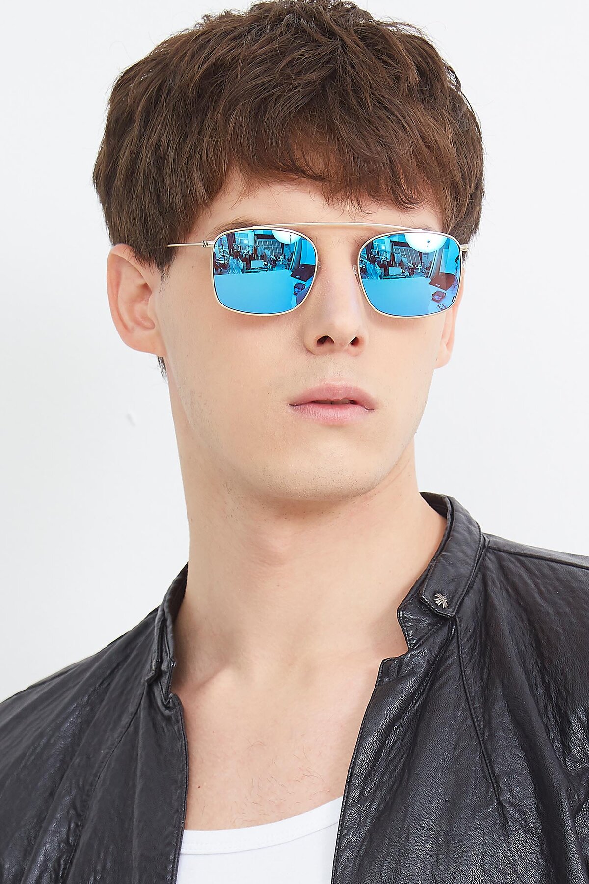 Men's lifestyle photography (portrait-1) of The Librarian in Copper with Blue Mirrored Lenses