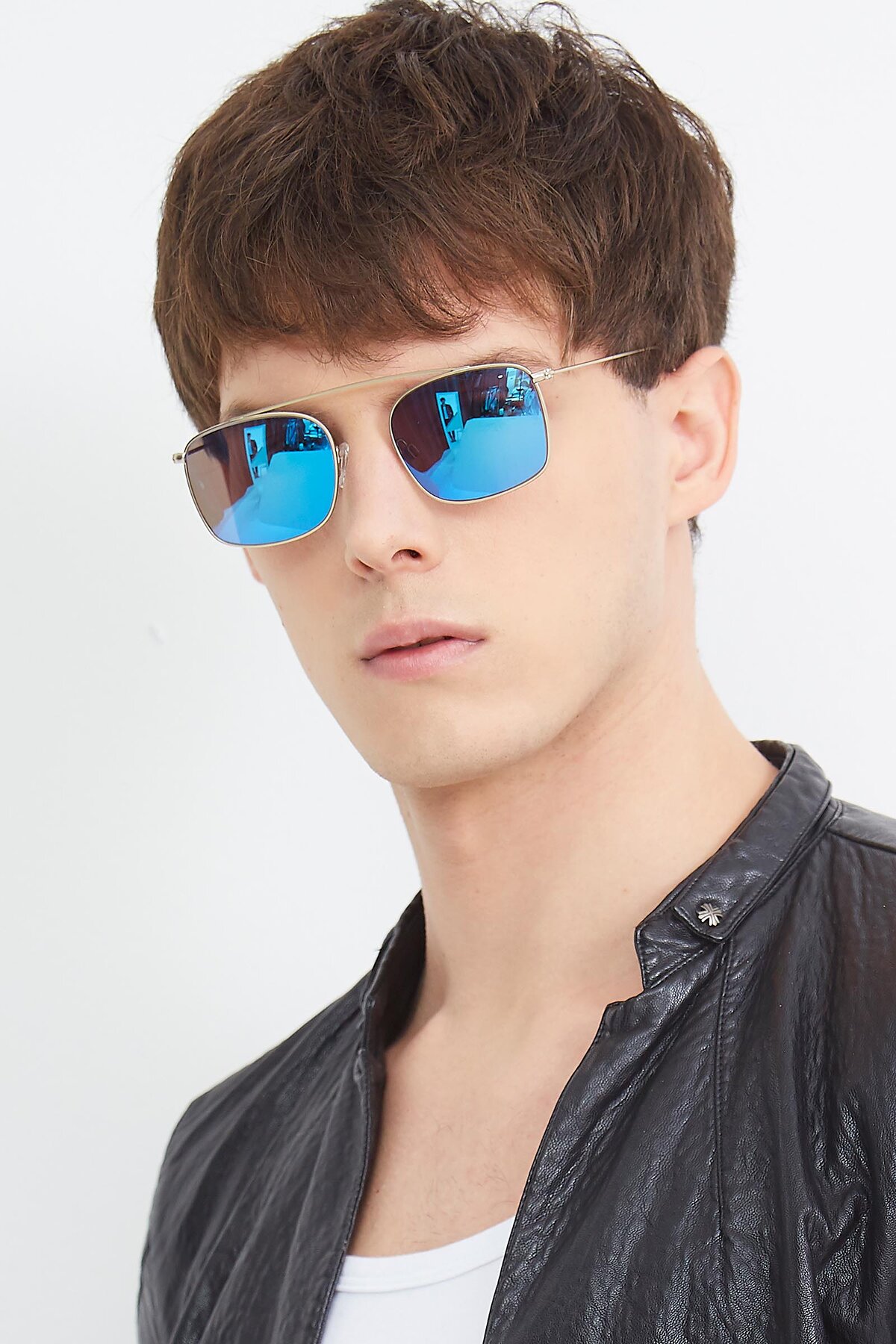 Men's lifestyle photography (portrait-2) of The Librarian in Copper with Blue Mirrored Lenses