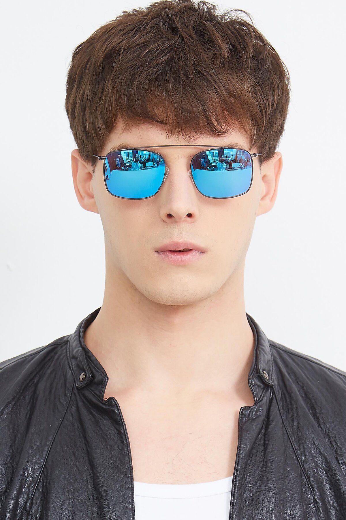 Men's lifestyle photography (portrait-1) of The Librarian in Gunmetal with Blue Mirrored Lenses