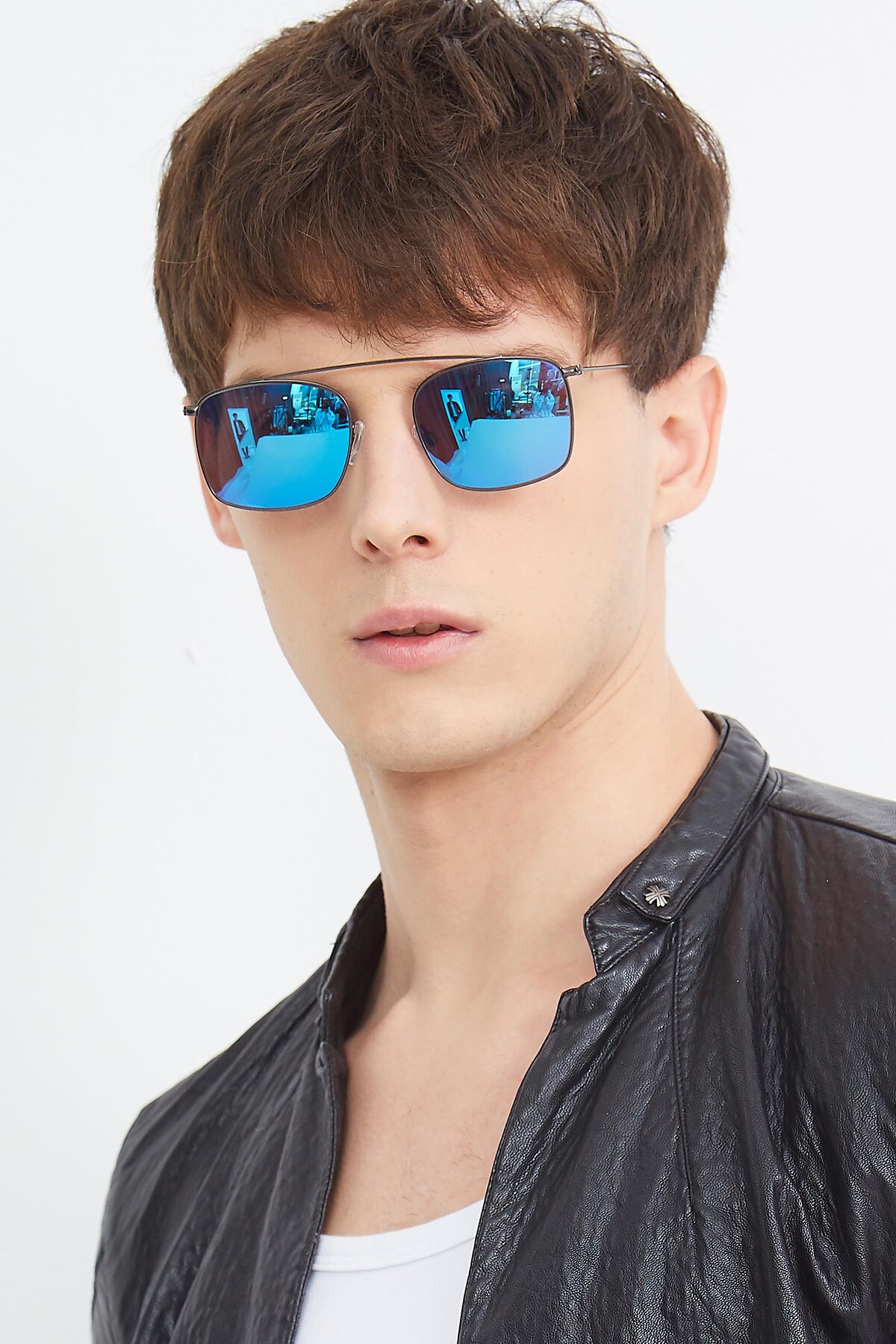 Men's lifestyle photography (portrait-2) of The Librarian in Gunmetal with Blue Mirrored Lenses