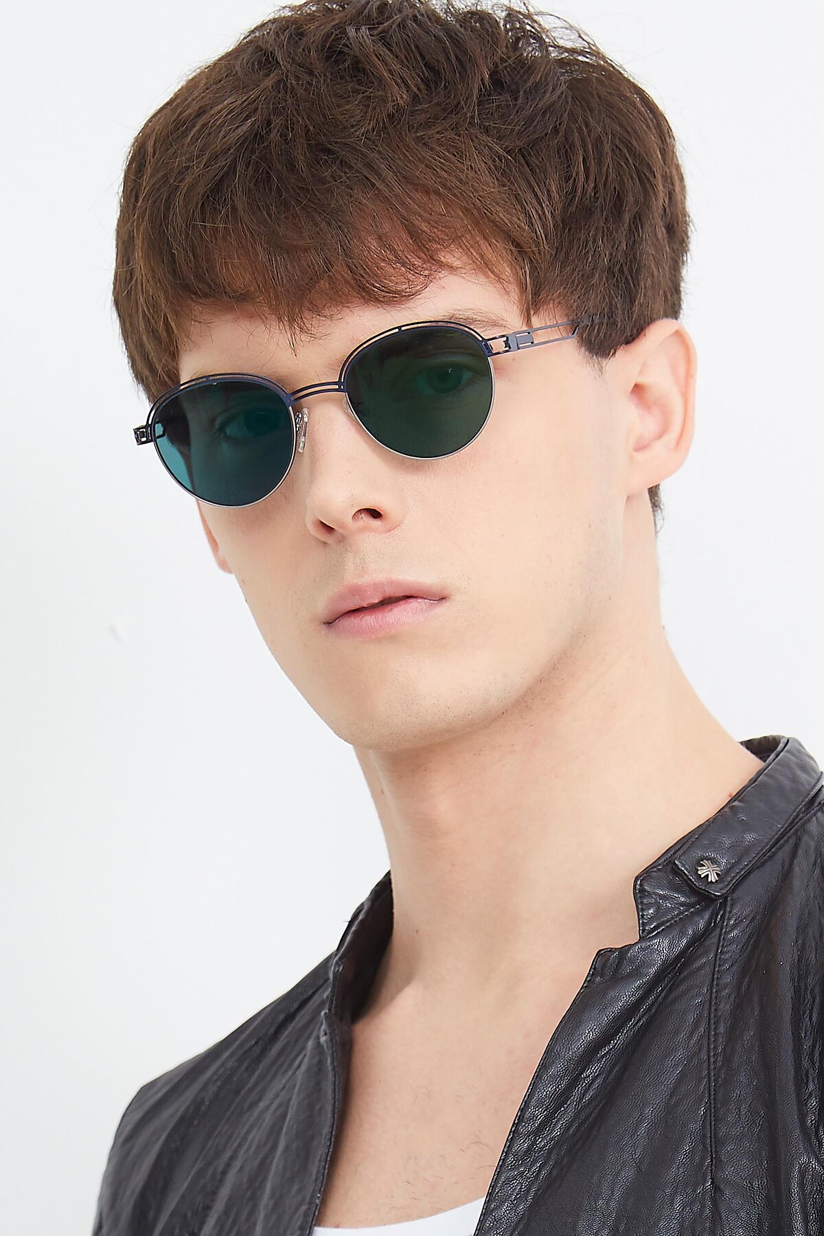 Men's lifestyle photography (portrait-1) of Marvel in Blue-Gunmetal with Green Polarized Lenses