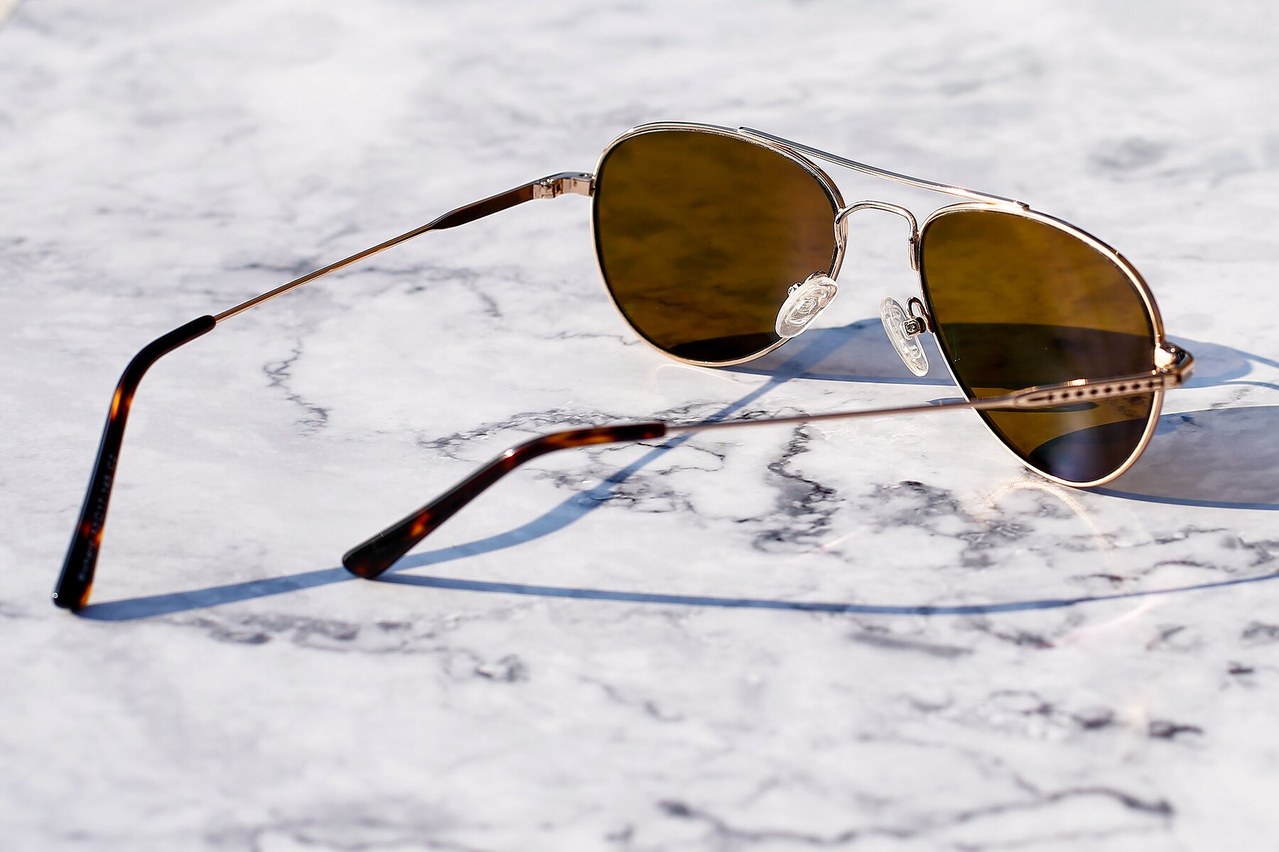 Lifestyle photography #4 of Richard in Gold with Brown Polarized Lenses