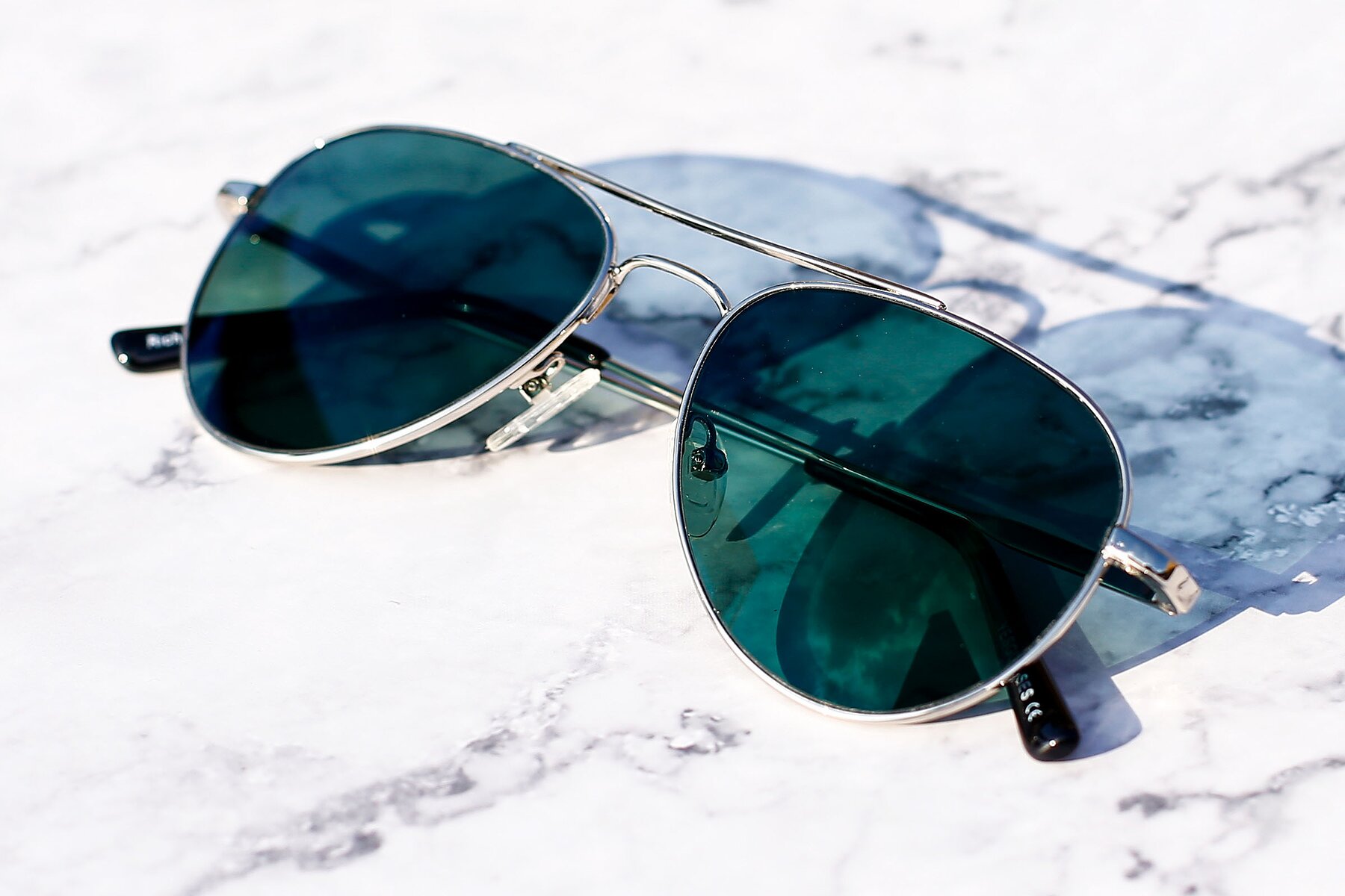 Lifestyle photography #1 of Richard in Silver with Green Polarized Lenses
