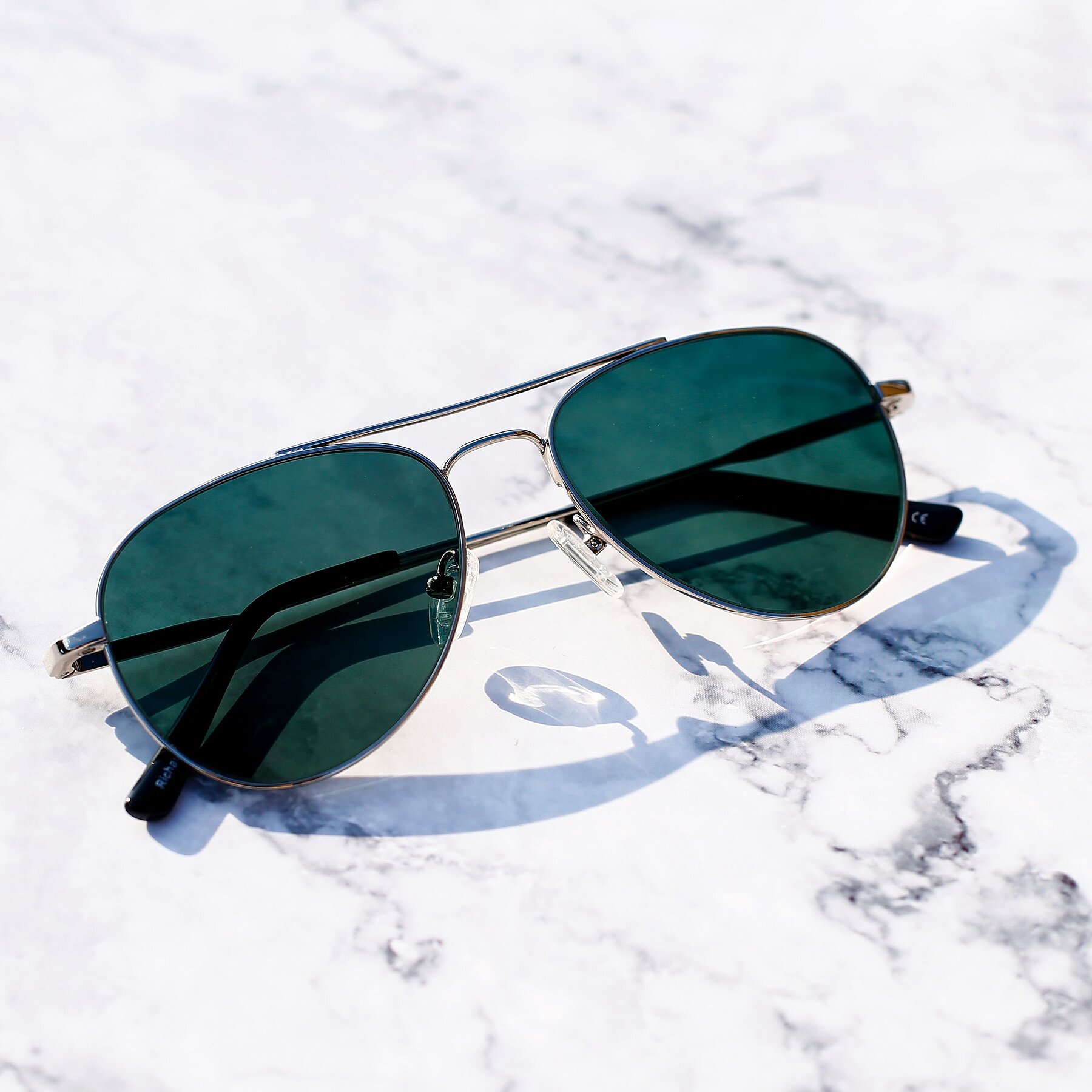 Lifestyle photography #2 of Richard in Silver with Green Polarized Lenses