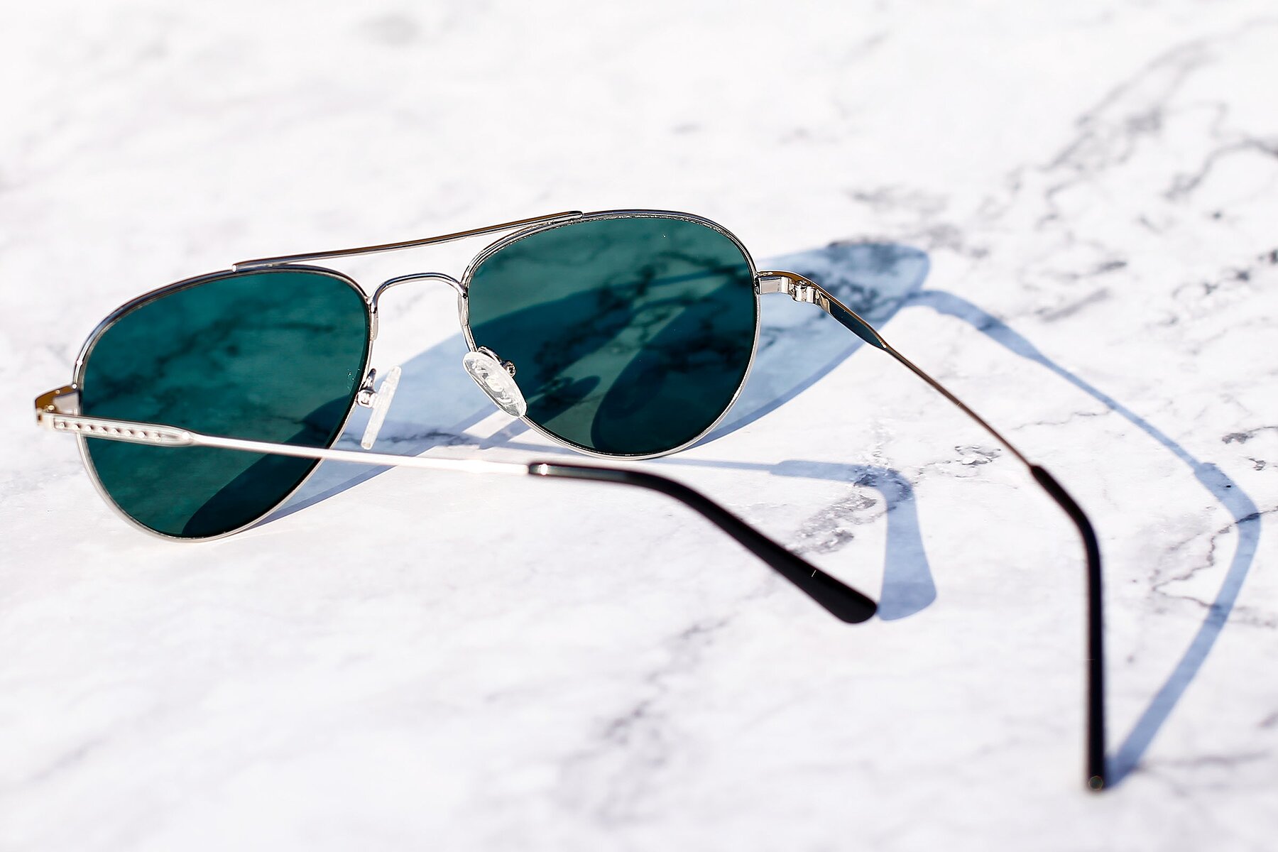 Lifestyle photography #4 of Richard in Silver with Green Polarized Lenses
