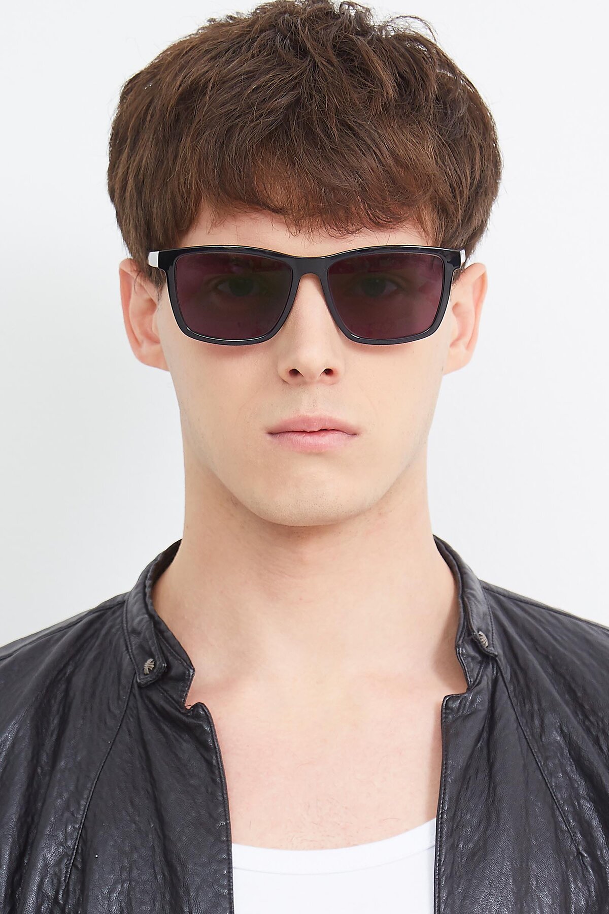 Men's lifestyle photography (portrait-1) of Sheldon in Black with Gray Tinted Lenses