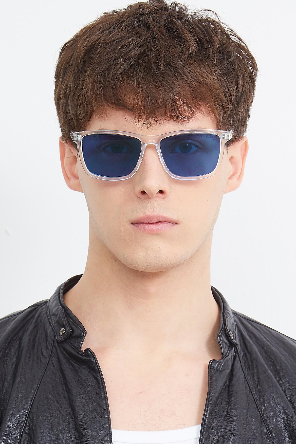 Men's lifestyle photography (portrait-1) of Sheldon in Clear with Blue Tinted Lenses