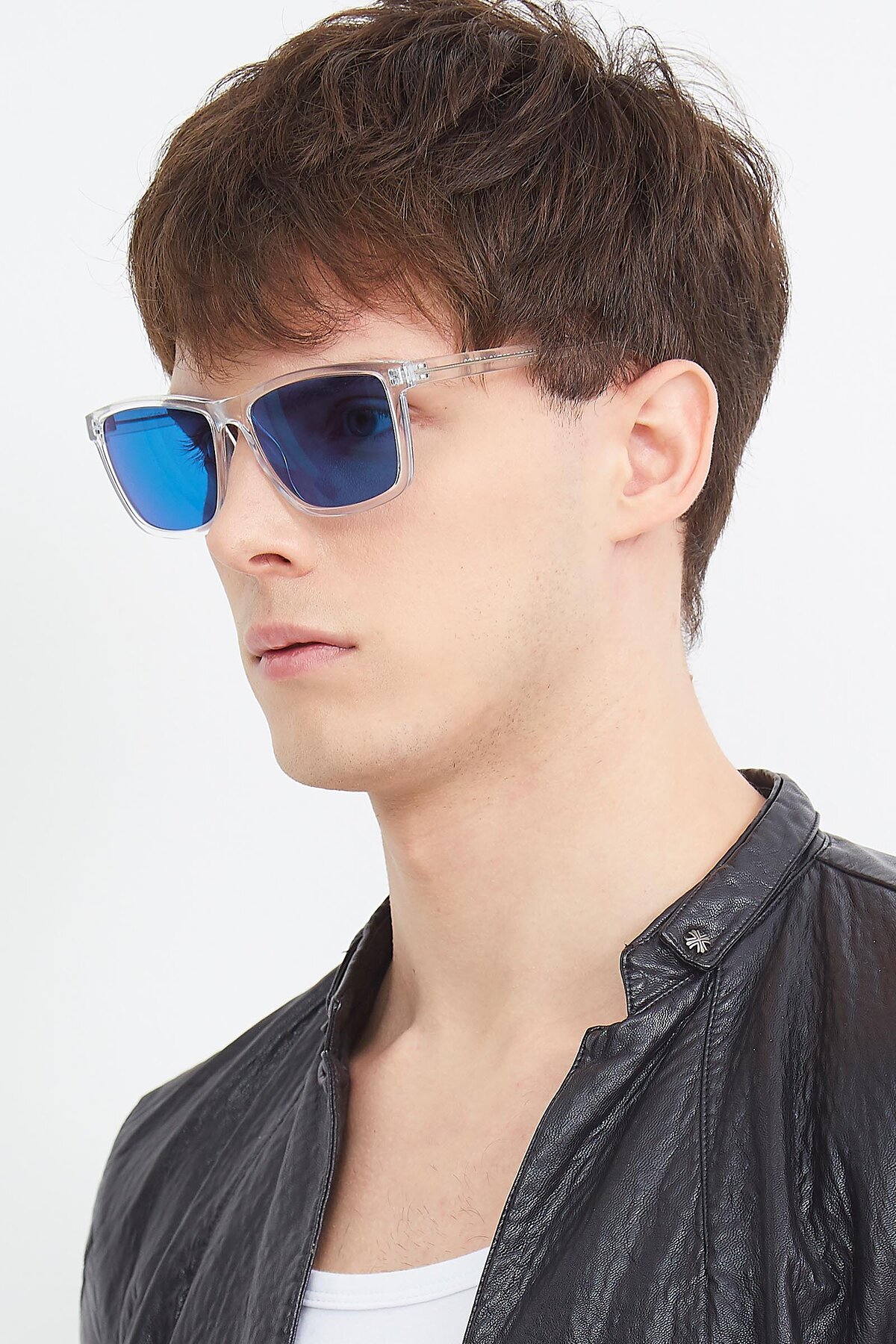 Men's lifestyle photography (portrait-2) of Sheldon in Clear with Blue Tinted Lenses