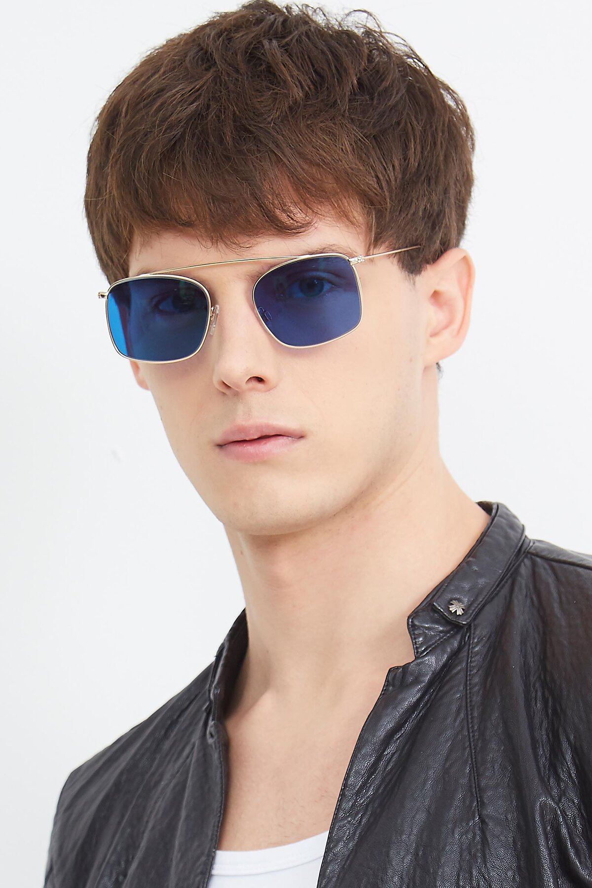 Men's lifestyle photography (portrait-2) of The Librarian in Copper with Blue Tinted Lenses