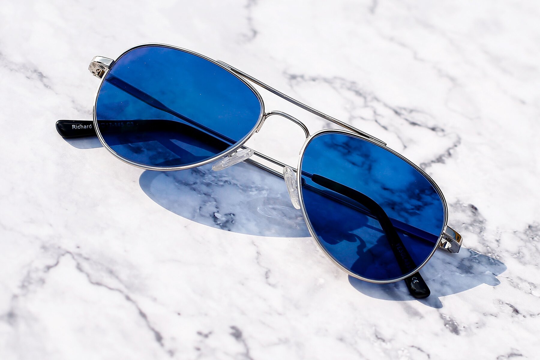 Lifestyle photography #1 of Richard in Silver with Blue Tinted Lenses