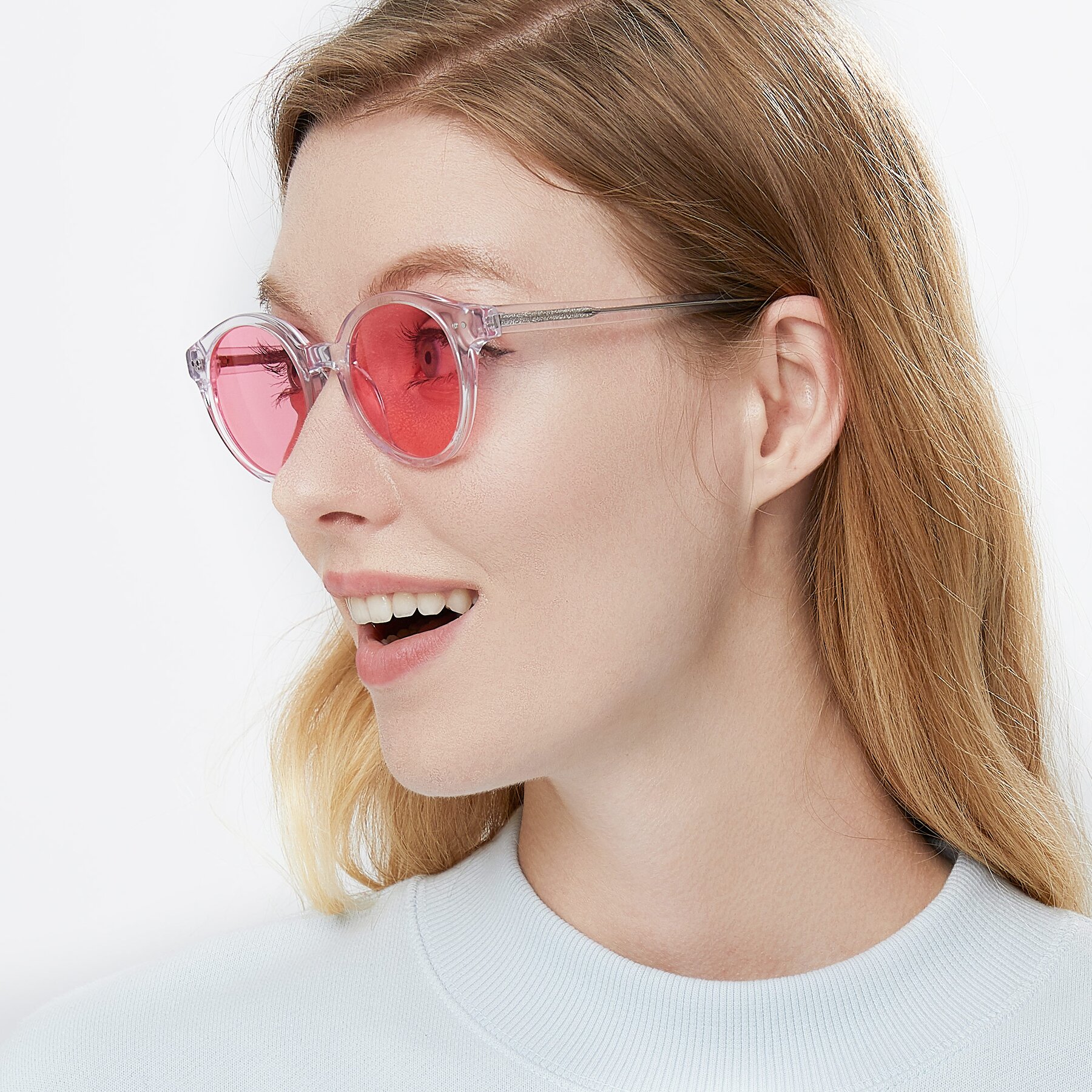 Women's lifestyle photography of Bellion in Clear with Pink Tinted Lenses