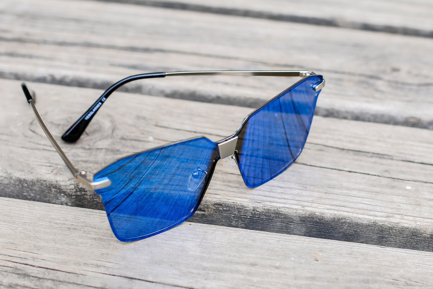 Women's lifestyle photography #2 of J2701 in Gunmetal with Blue Mirrored TAC Lenses