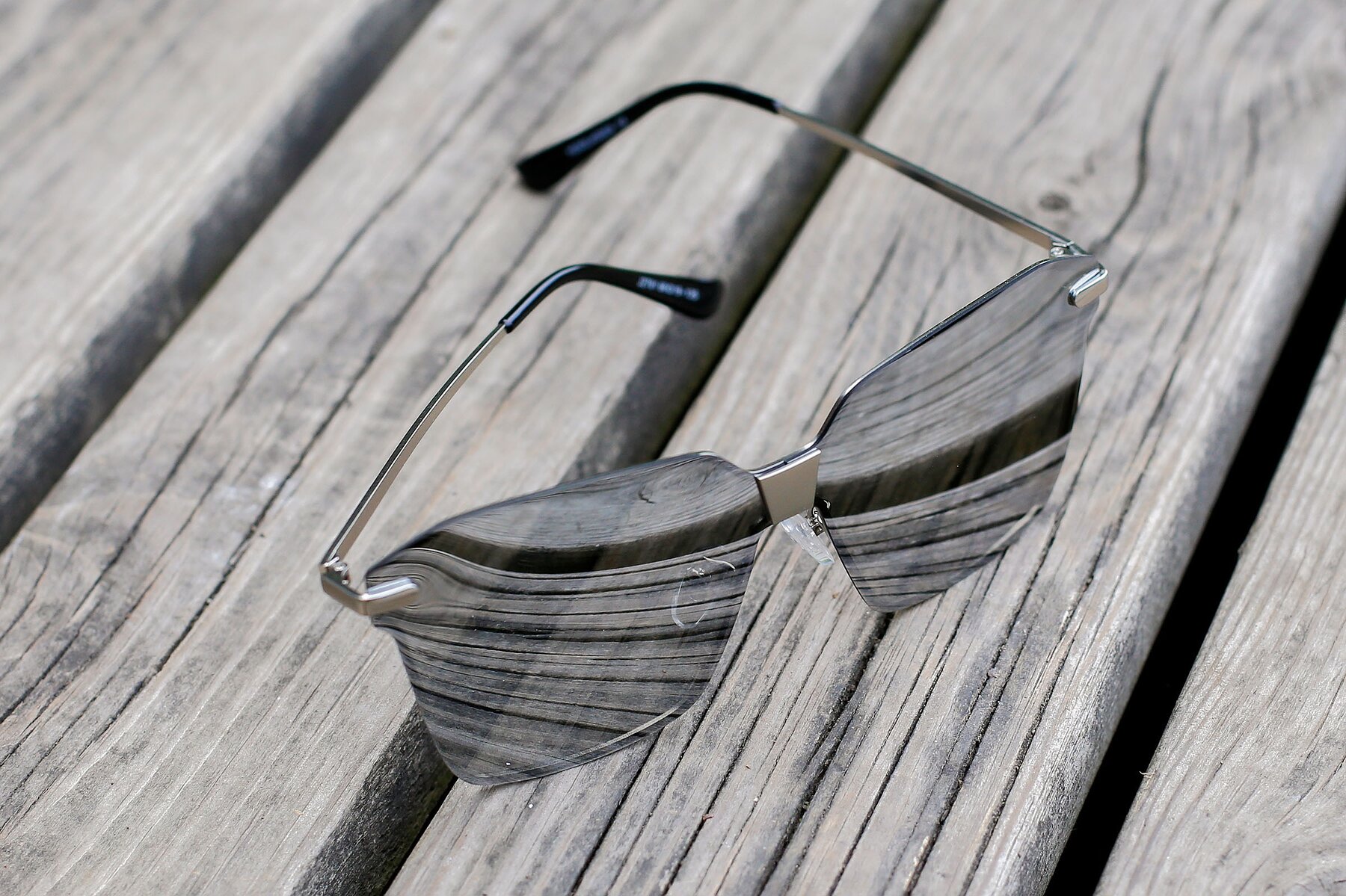 Lifestyle photography #2 of J2701 in Gunmetal with Silver Mirrored TAC Lenses