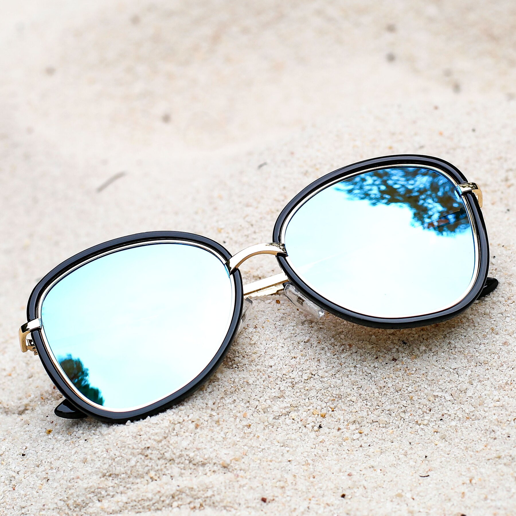 Women's lifestyle photography #1 of JC2033 in Black-Gold with Blue Mirrored TAC Lenses