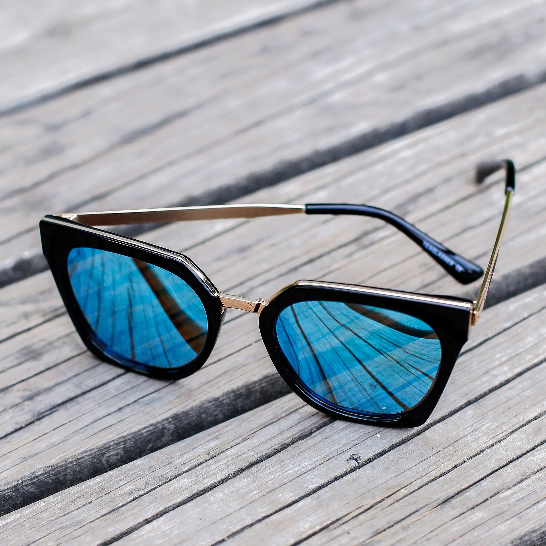 Lifestyle photography #2 of 2507 in Black-Gold with Blue Mirrored TAC Lenses